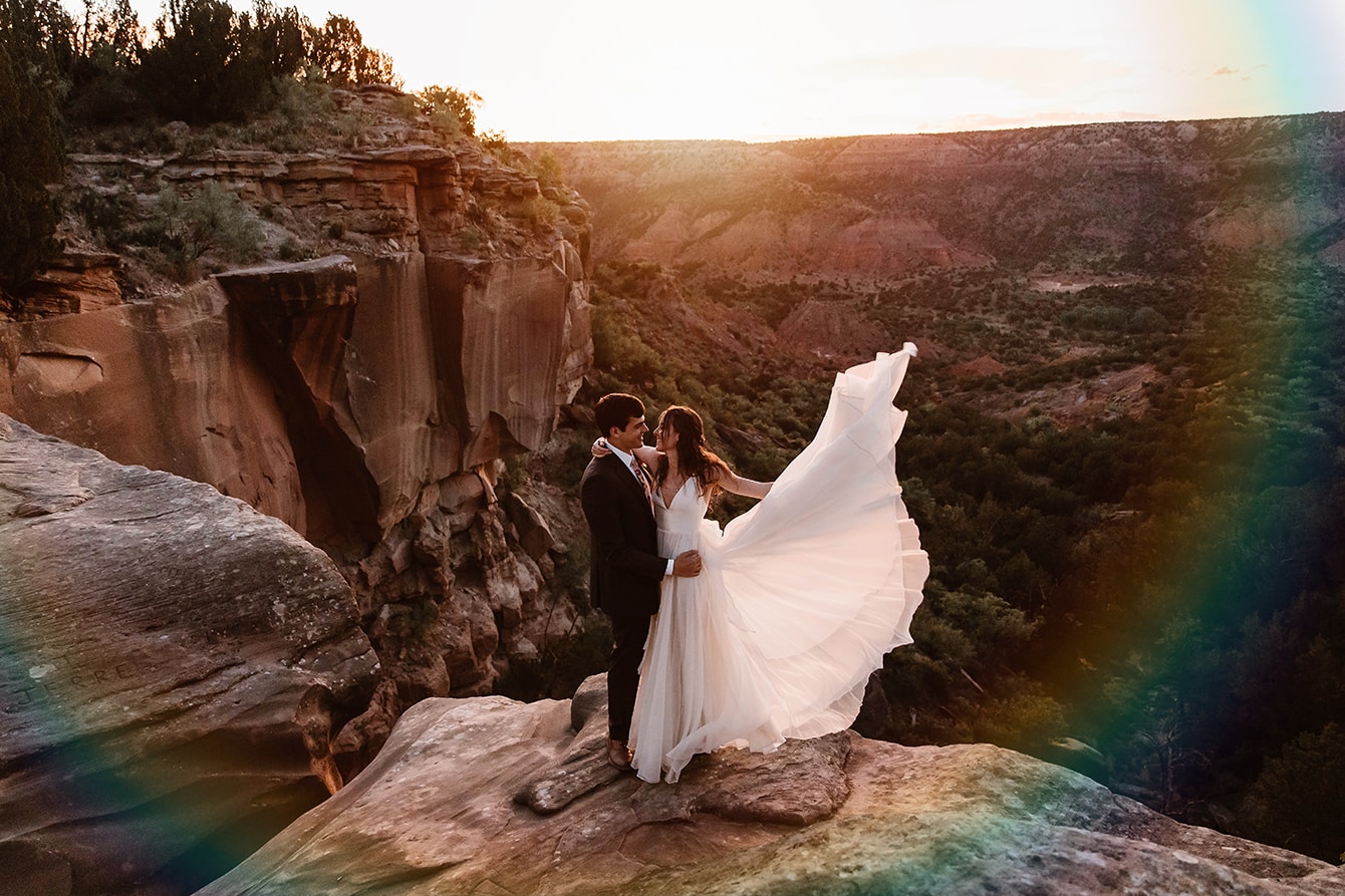 palo duro canyon, palo duro canyon state park, west texas wedding, places to elope in texas, texas small weddings, destination weddings in texas, bride and groom first look, cliffside wedding, cliffside elopement, desert elopement, COVID wedding, lighthouse trail, brit nicole photography, destination wedding photographer, texas wedding photographer, texas national parks, moab rocks, places to get married, places to elope in texas, bridal dress in austin, timberland hiking boots, bridal hiking boots, amarillo photographer, photographers in amarillo, photographer near me, palo duro canyon trails